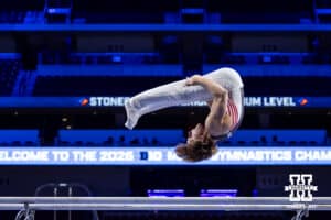 Nebraska Cornhusker Caden Clinton performs on the parallel bars during the Big Ten Men’s Gymnastics Championships on Saturday, April 4, 2026, in Lincoln. Photo by John S. Peterson.