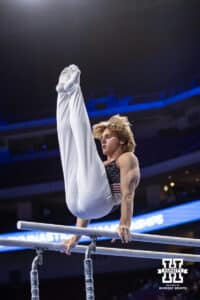 Nebraska Cornhusker Caden Clinton performs on the parallel bars during the Big Ten Men’s Gymnastics Championships on Saturday, April 4, 2026, in Lincoln. Photo by John S. Peterson.