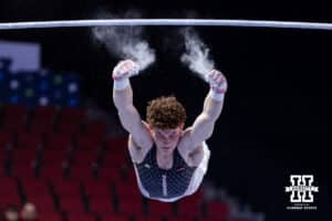 Nebraska Cornhusker Max Odden misses grabbing the bar during the Big Ten Men’s Gymnastics Championships on Saturday, April 4, 2026, in Lincoln. Photo by John S. Peterson.