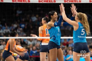 Omaha Supernova Reagan Cooper (8) and Brooke Nuneviller (5) check into the match during a major league volleyball match against the Indy Ignite on April 4, 2026, in Omaha, Nebraska. Photo by Brandon Tiedemann