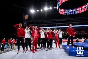 Nebraska Cornhuskers chant "Go Big Red" during the Big Ten Men's Gymnastics Team Championship on Friday, April 3, 2026, in Lincoln. Photo by John S. Peterson.