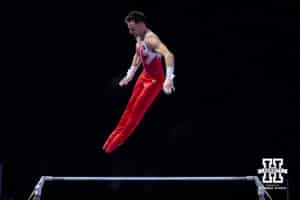 Nebraska Cornhusker Alex Nitache performs on the bar during the Big Ten Men's Gymnastics Team Championship on Friday, April 3, 2026, in Lincoln. Photo by John S. Peterson.
