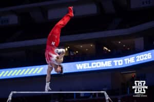 Nebraska Cornhusker Anthony Koppie performs on the bar during the Big Ten Men's Gymnastics Team Championship on Friday, April 3, 2026, in Lincoln. Photo by John S. Peterson.