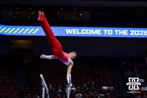 Nebraska Cornhusker Alex Nitache performs on the bars during the Big Ten Men's Gymnastics Team Championship on Friday, April 3, 2026, in Lincoln. Photo by John S. Peterson.