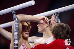 Nebraska Cornhusker Caden Clinton set the bars during the Big Ten Men's Gymnastics Team Championship on Friday, April 3, 2026, in Lincoln. Photo by John S. Peterson.