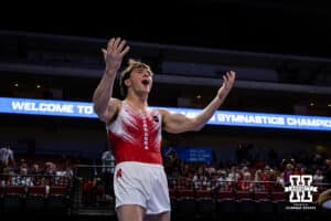 Nebraska Cornhusker Chase Mondi celebrates his performance on the vault during the Big Ten Men's Gymnastics Team Championship on Friday, April 3, 2026, in Lincoln. Photo by John S. Peterson.