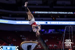 Nebraska Cornhusker Nathan York performs on the vault during the Big Ten Men's Gymnastics Team Championship on Friday, April 3, 2026, in Lincoln. Photo by John S. Peterson.