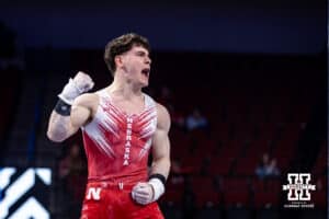 Nebraska Cornhusker Sam Rakita celebrates his performance on the rings during the Big Ten Men's Gymnastics Team Championship on Friday, April 3, 2026, in Lincoln. Photo by John S. Peterson.