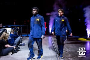 Michigan Wolverine and Olympic athlete Fred Richard leads out his team during the Big Ten Men's Gymnastics Team Championship on Friday, April 3, 2026, in Lincoln. Photo by John S. Peterson.