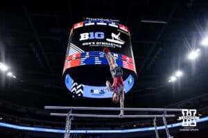 Nebraska Cornhusker Max Odden warms up on the bars during the Big Ten Men's Gymnastics Team Championship on Friday, April 3, 2026, in Lincoln. Photo by John S. Peterson.