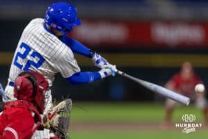 Creighton Bluejay first baseman Chris Baillargeon (22) hits a double, scoring two runs, against the Nebraska Cornhuskers in the sixth inning during a college baseball game on Tuesday, March 31, 2026, in Omaha. Photo by John S. Peterson.