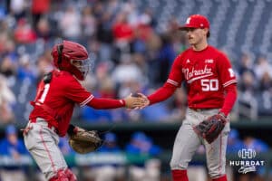 Nebraska Cornhusker pitcher Gavin Blachowicz (50) gets five from catcher Jeter Worthley (0) finishing the third inning against the Creighton Bluejays during a college baseball game on Tuesday, March 31, 2026, in Omaha. Photo by John S. Peterson.