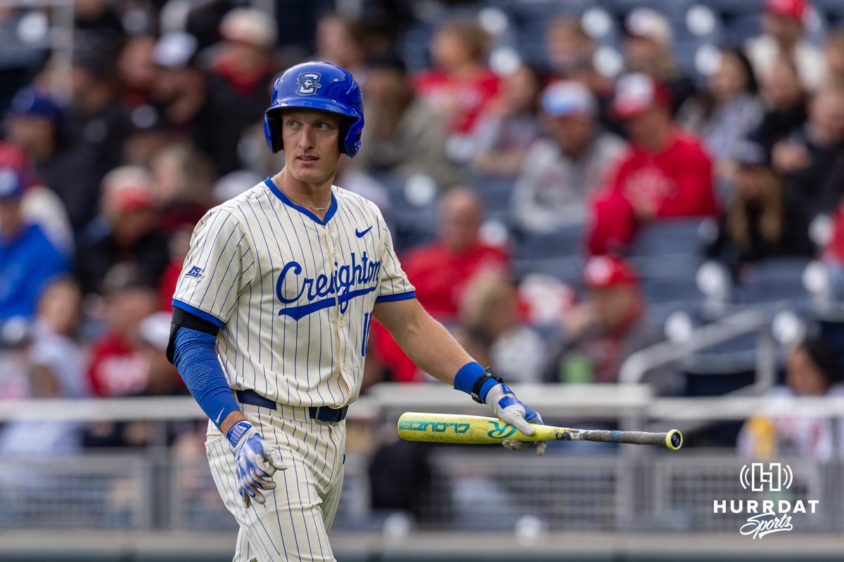 Creighton Bluejay catcher Nick Bowron (10) looks at Nebraska Cornhusker pitcher Gavin Blachowicz after striking out in the first inning during a college baseball game on Tuesday, March 31, 2026, in Omaha. Photo by John S. Peterson.