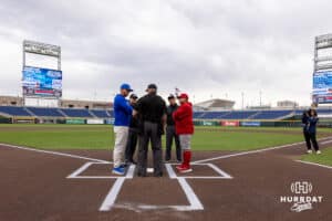 Creighton Bluejay head coach Mark Kingston and Nebraska Cornhusker head coach Will Bolt meet before a college baseball game on Tuesday, March 31, 2026, in Omaha. Photo by John S. Peterson.