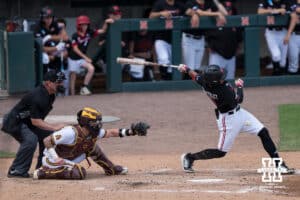 Nebraska Cornhusker Jeter Worthley (0) foul tips a ball during a regional baseball game against Arizona State on May 31, 2026, in Lincoln, Nebraska. Photo by Brandon Tiedemann.