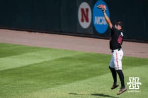 Nebraska Cornhusker Drew Grego (10) catches a fly ball during a regional baseball game against Arizona State on May 31, 2026, in Lincoln, Nebraska. Photo by Brandon Tiedemann.