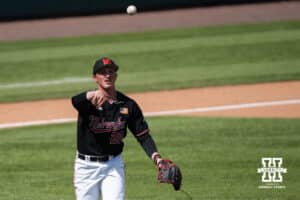 Nebraska Cornhusker Kevin Mannell (20) throws to first base during a regional baseball game against Arizona State on May 31, 2026, in Lincoln, Nebraska. Photo by Brandon Tiedemann.