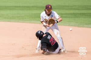 Nebraska Cornhusker Trey Fikes (21) slides into second base during a regional baseball game against Arizona State on May 31, 2026, in Lincoln, Nebraska. Photo by Brandon Tiedemann.
