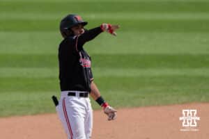 Nebraska Cornhusker Jeter Worthley (0) celebrates his double during a regional baseball game against Arizona State on May 31, 2026, in Lincoln, Nebraska. Photo by Brandon Tiedemann.