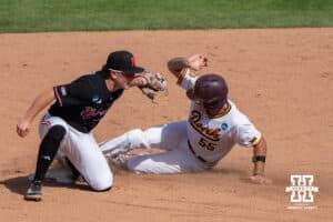 Nebraska Cornhusker Rhett Stokes (9) tags out the runner during a regional baseball game against Arizona State on May 31, 2026, in Lincoln, Nebraska. Photo by Brandon Tiedemann.