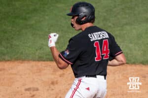 Nebraska Cornhusker Case Sanderson (14) cheers during a regional baseball game against Arizona State on May 31, 2026, in Lincoln, Nebraska. Photo by Brandon Tiedemann.