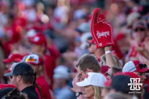 A Nebraska Cornhusker fan holds up a foam finger during a regional baseball game against Ole Miss on May 30, 2026, in Lincoln, Nebraska. Photo by Brandon Tiedemann.