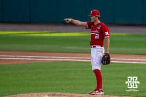 Nebraska Cornhusker Ty Horn (2) thanks his teammate during a regional baseball game against Ole Miss on May 30, 2026, in Lincoln, Nebraska. Photo by Brandon Tiedemann.
