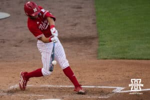 Nebraska Cornhusker Jett Buck (1) hits a home run during a regional baseball game against Ole Miss on May 30, 2026, in Lincoln, Nebraska. Photo by Brandon Tiedemann.