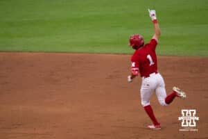 Nebraska Cornhusker Jett Buck (1) celebrates his home run during a regional baseball game against Ole Miss on May 30, 2026, in Lincoln, Nebraska. Photo by Brandon Tiedemann.