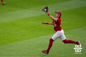 Nebraska Cornhusker Drew Grego (10) catches a fly ball during a regional baseball game against Ole Miss on May 30, 2026, in Lincoln, Nebraska. Photo by Brandon Tiedemann.