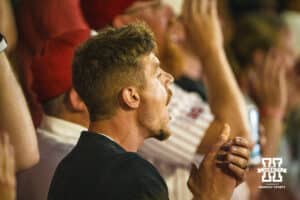 A Nebraska Cornhusker fan cheers during a regional baseball game against Ole Miss on May 30, 2026, in Lincoln, Nebraska. Photo by Brandon Tiedemann.