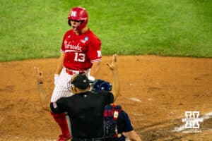 Nebraska Cornhusker Will Jesske (13) celebrates a walk during a regional baseball game against Ole Miss on May 30, 2026, in Lincoln, Nebraska. Photo by Brandon Tiedemann.