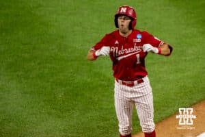 Nebraska Cornhusker Jett Buck (1) jumps in shock during a regional baseball game against Ole Miss on May 30, 2026, in Lincoln, Nebraska. Photo by Brandon Tiedemann.