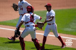Nebraska Cornhusker Jalen Worthley (42) high fives Jeter Worthley (0) during a regional baseball game against Ole Miss on May 31, 2026, in Lincoln, Nebraska. Photo by Brandon Tiedemann.