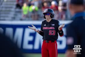 Nebraska Cornhusker outfielder Hannah Coor (23) reacts to the double on a dropped fly ball by an Alabama Crimson Tide outfielder in the sixth inning during the WCWS second round on Saturday, May 30, 2026, in Oklahoma City. Photo by John S. Peterson.