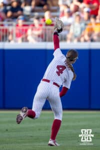 Alabama Crimson Tide infielder Jena Young (4) drops the fly ball from Nebraska Cornhusker Hannah Coor (23) in the sixth inning during the WCWS second round on Saturday, May 30, 2026, in Oklahoma City. Photo by John S. Peterson.