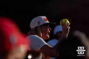 Nebraska Cornhusker Hannah Camenzind (9) mohter recieves the home run ball she hit in the fourth inning against the Alabama Crimson Tideduring the WCWS second round on Saturday, May 30, 2026, in Oklahoma City. Photo by John S. Peterson.