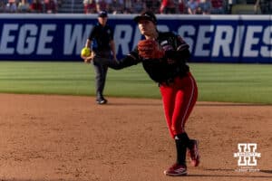 Nebraska Cornhusker infielder Lauren Camenzind (2) throws to first for an out against the Alabama Crimson Tide in the third inning during the WCWS second round on Saturday, May 30, 2026, in Oklahoma City. Photo by John S. Peterson.