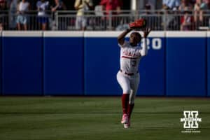 Alabama Crimson Tide outfielder Kristen White (3) makes a catch for an out against the Nebraska Cornhuskers in the third inning during the WCWS second round on Saturday, May 30, 2026, in Oklahoma City. Photo by John S. Peterson.