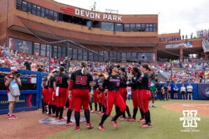 Nebraska Cornhusker utility Samantha Bland (29) runs out when introduced before taking on the Alabama Crimson Tide during the WCWS second round on Saturday, May 30, 2026, in Oklahoma City. Photo by John S. Peterson.
