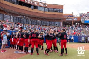 Nebraska Cornhusker starting pitcher Jordy Frahm (98) runs out when introduced before taking on the Alabama Crimson Tide during the WCWS second round on Saturday, May 30, 2026, in Oklahoma City. Photo by John S. Peterson.