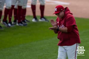 Nebraska Cornhusker head coach WIll Bolt runs onto the field during a regional baseball game against SDSU on May 29, 2026, in Lincoln, Nebraska. Photo by Brandon Tiedemann.