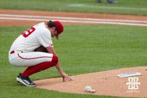 Nebraska Cornhusker Carson Jasa (39) kneels during a regional baseball game against SDSU on May 29, 2026, in Lincoln, Nebraska. Photo by Brandon Tiedemann.
