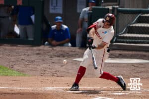Nebraska Cornhusker Joshua Overbeek (4) hits during a regional baseball game against SDSU on May 29, 2026, in Lincoln, Nebraska. Photo by Brandon Tiedemann.