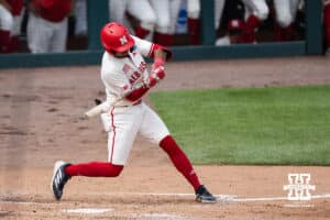 Nebraska Cornhusker Jeter Worthley (0) hits the ball during a regional baseball game against SDSU on May 29, 2026, in Lincoln, Nebraska. Photo by Brandon Tiedemann.