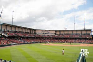 Nebraska Cornhusker fans sit in the stands during a regional baseball game against SDSU on May 29, 2026, in Lincoln, Nebraska. Photo by Brandon Tiedemann.