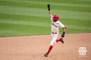 Nebraska Cornhusker Jett Buck (1) celebrates his home run during a regional baseball game against SDSU on May 29, 2026, in Lincoln, Nebraska. Photo by Brandon Tiedemann.