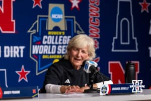 Nebraska Cornhusker head coach Rhonda Revelle talks about the song Delta Dawn and meeting Tanya Tucker answering a question from the media after the first game of the WCWS on Thursday, May 28, 2026, in Oklahoma City. Photo by John S. Peterson.