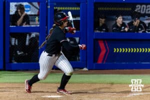 Nebraska Cornhusker Ava Kuszak (7) hits a two-run walk-off home run Arkansas Razorbacks in the first round of the WCWS on Thursday, May 28, 2026, in Oklahoma City. Photo by John S. Peterson.