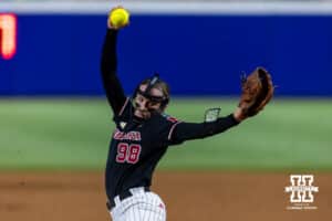 Nebraska Cornhusker starting pitcher Jordy Frahm (98) throws a pitch against the Arkansas Razorbacks in the second inning during the WCWS first round on Thursday, May 28, 2026, in Oklahoma City. Photo by John S. Peterson.
